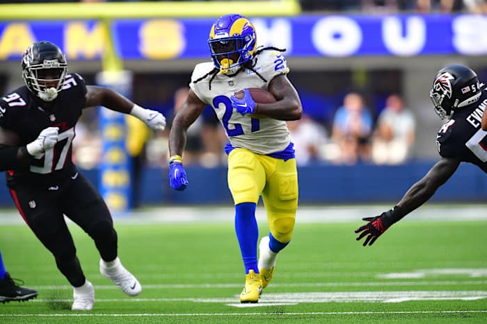 Henderson running against the Atlanta Falcons.